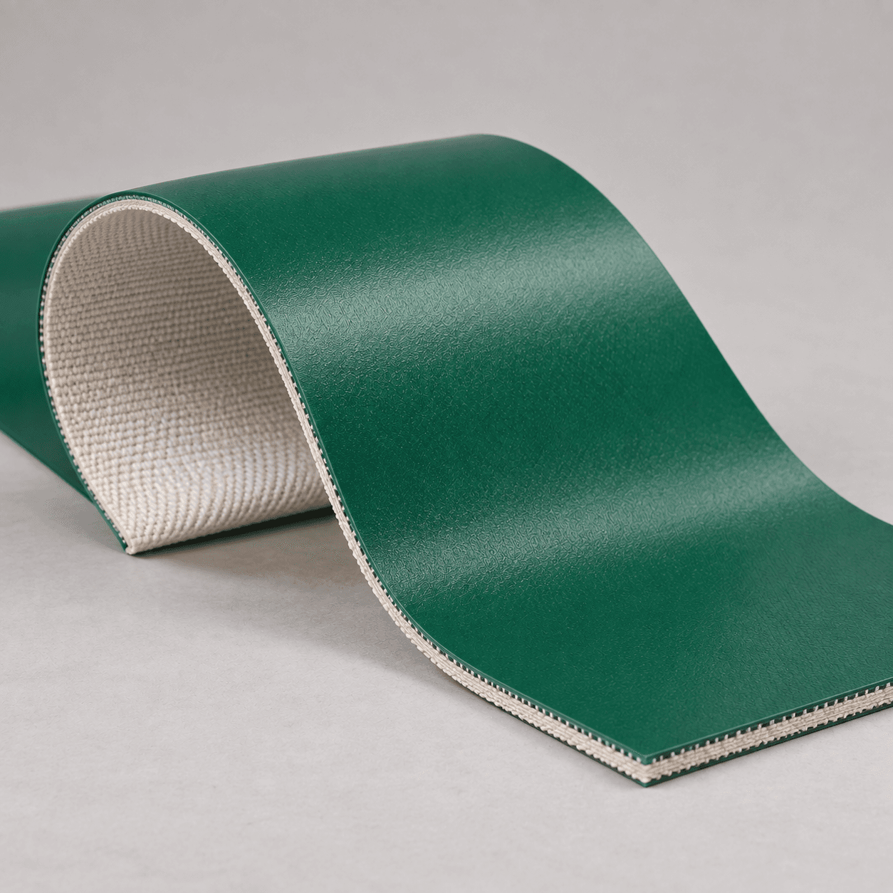 Generated illustration of green PVC smooth top conveyor belt with woven fabric underside